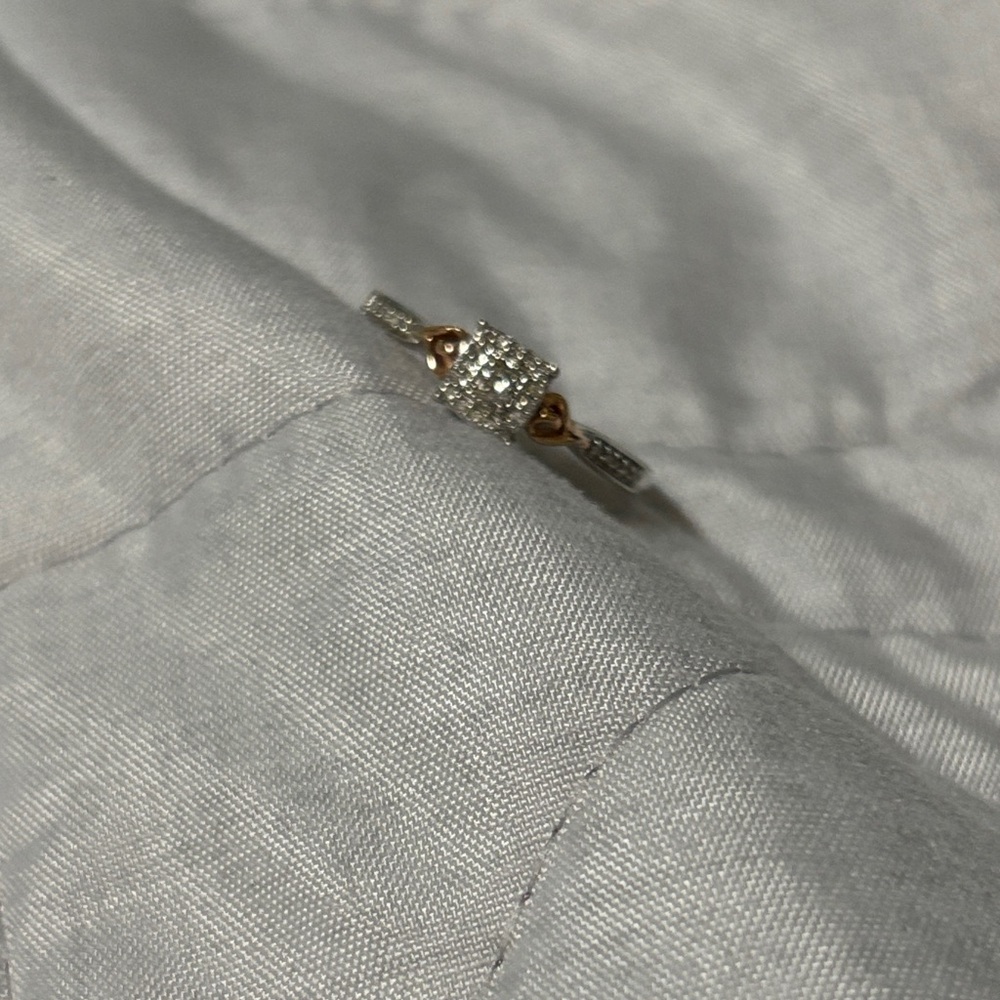 Elegant Diamond Ring with Gold Heart Accents size 7